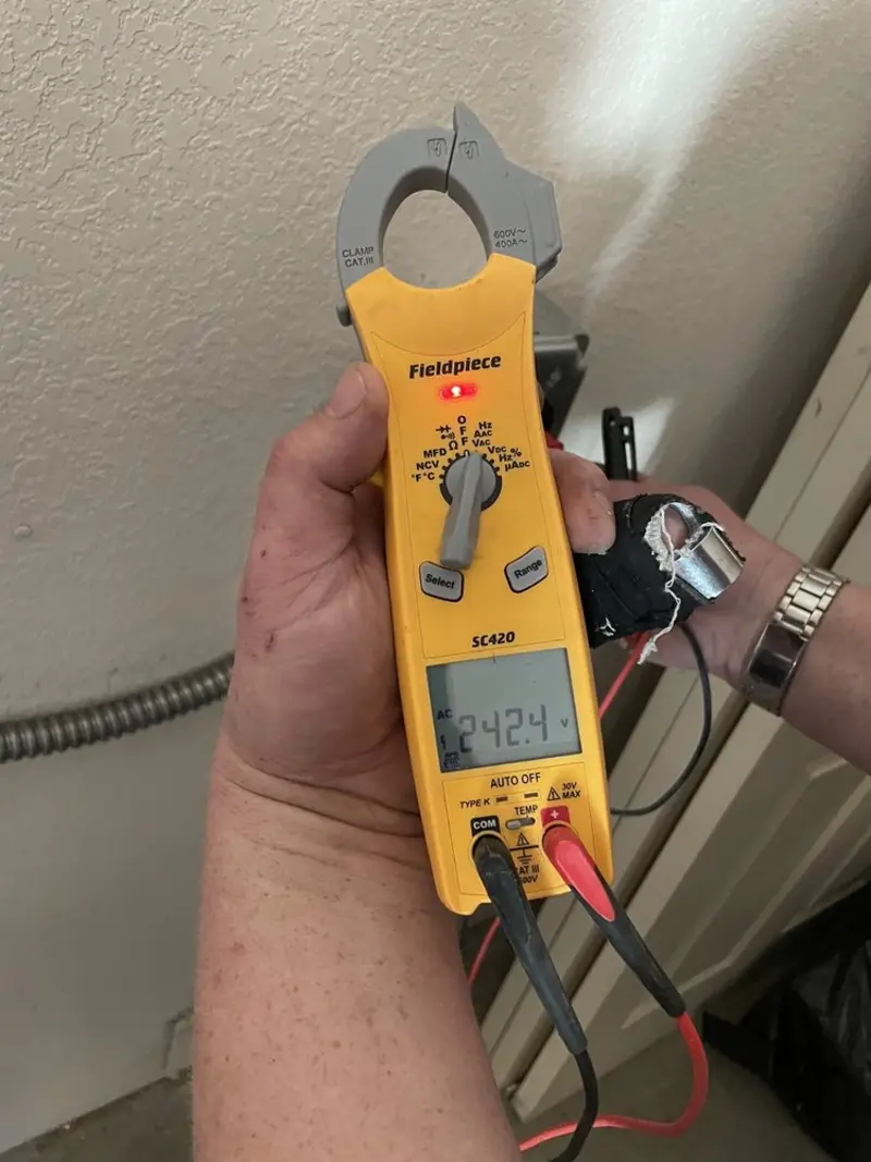 Voltage testing with clamp meter during Circuit Breaker Repair in South Salt Lake